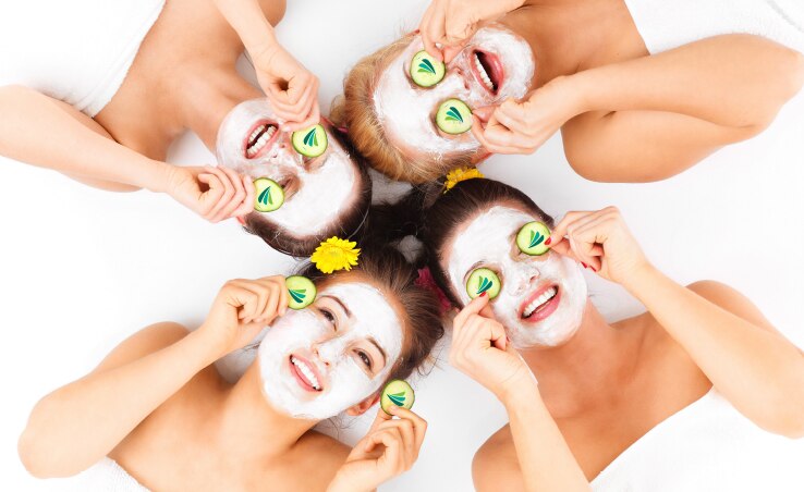 Women with spa face masks on