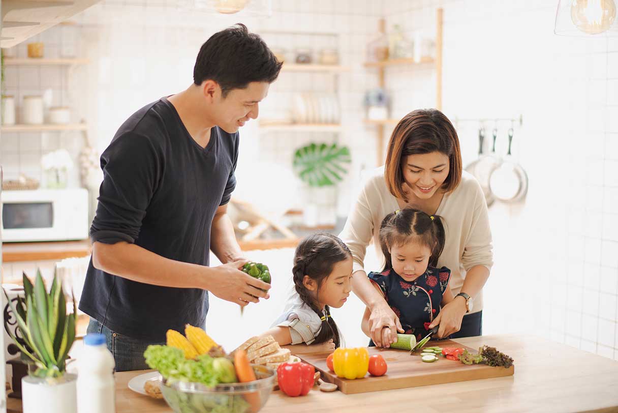 Family preparing a meal in a kitchen