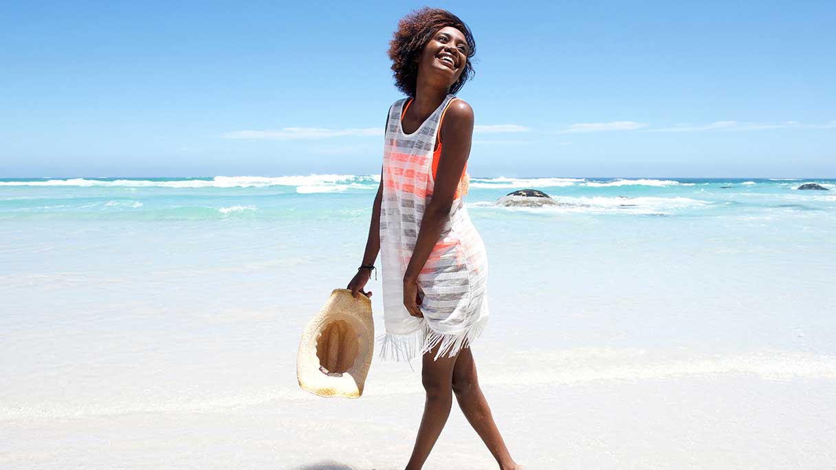 Woman walking on a beach