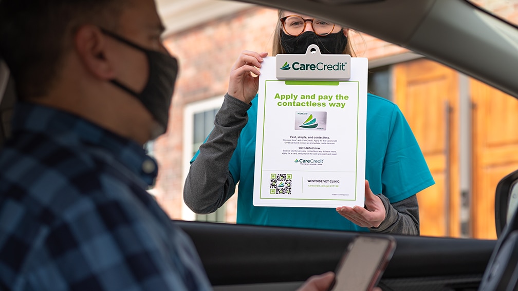 Curbside vet with CareCredit contactless pay