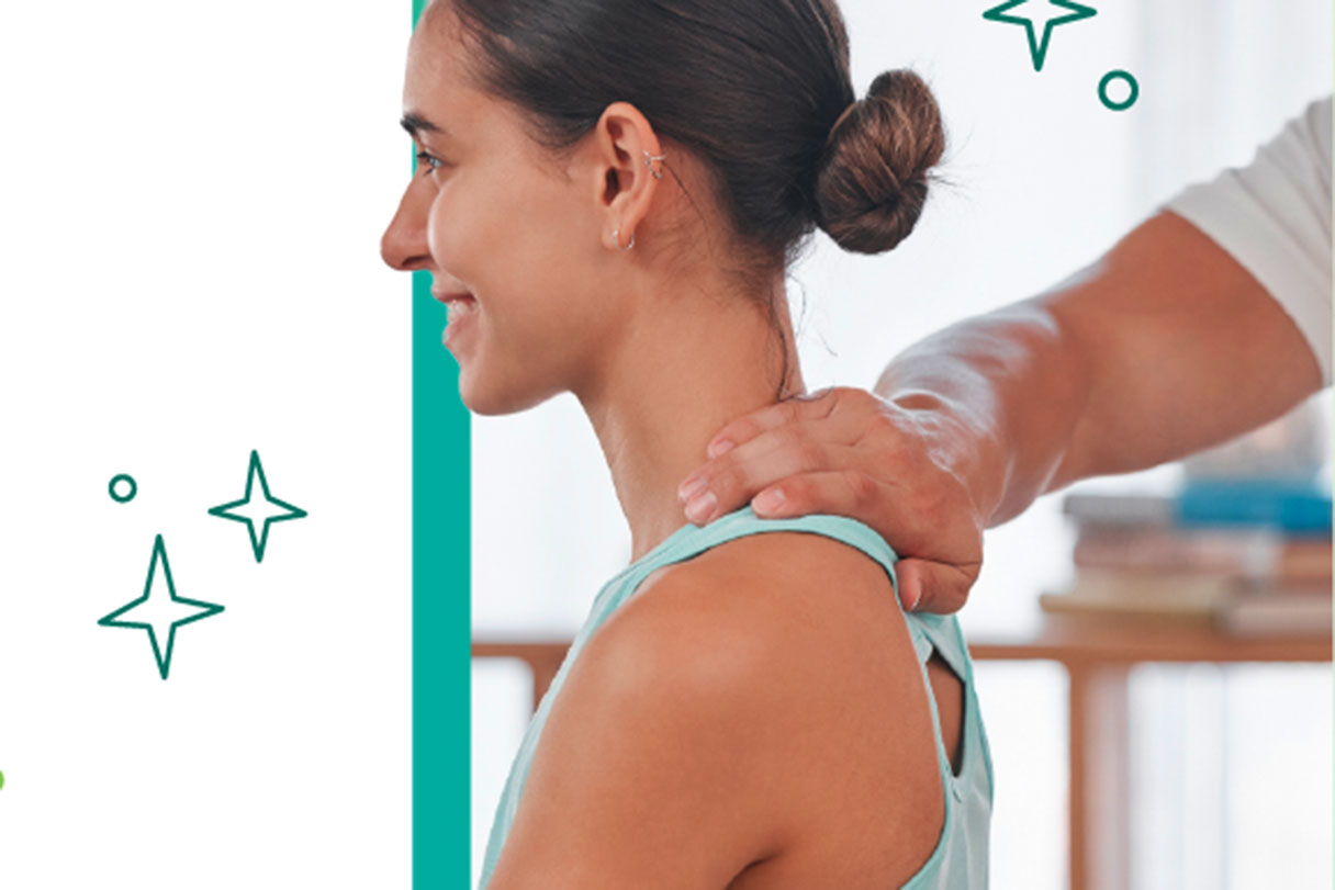 Chiropractor stretching woman's shoulder