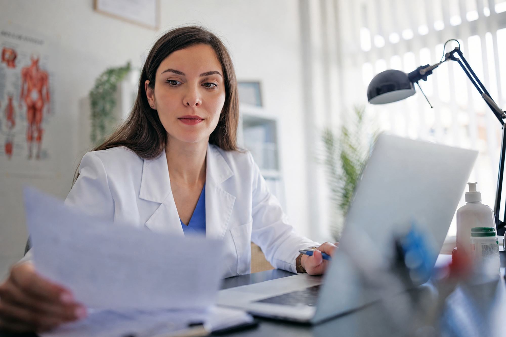 Health professional looking through paperwork