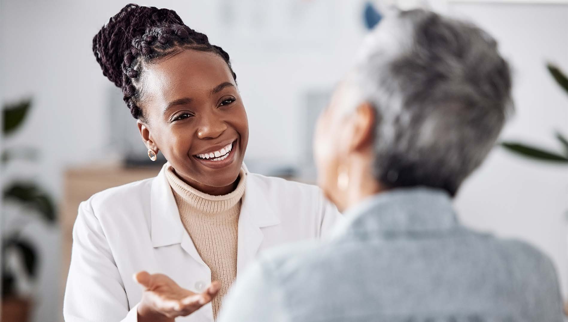 Doctor speaking with patient