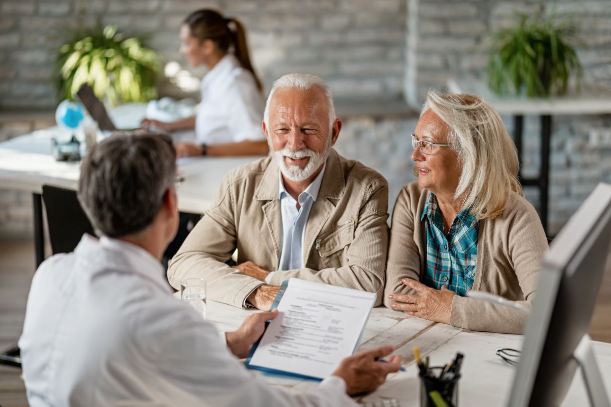 Couple speaking with medical professional