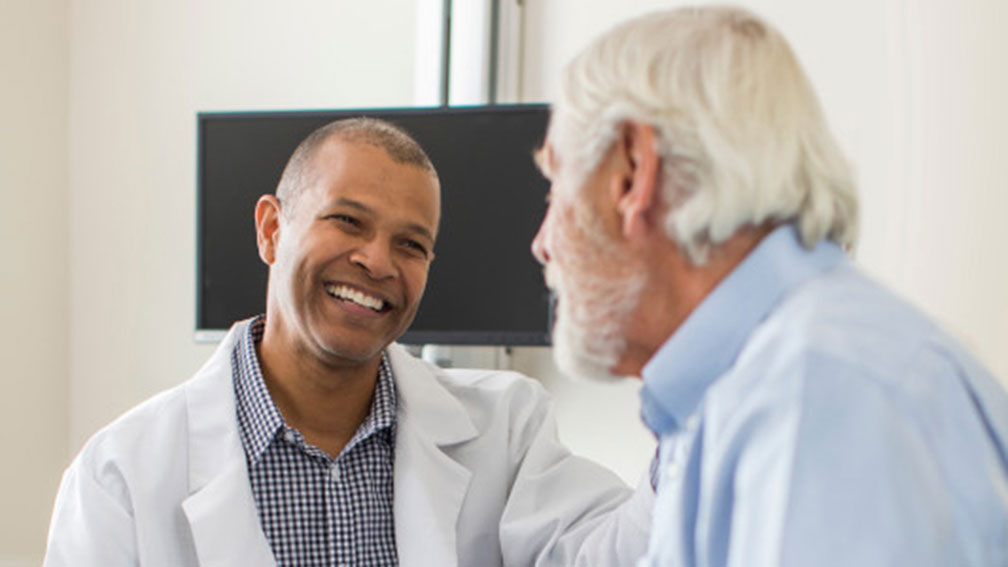 Doctor speaking with a patient