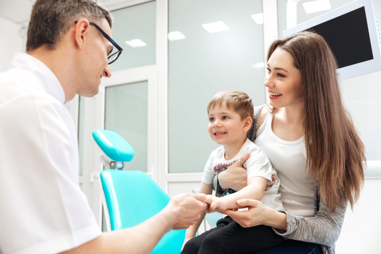 Doctor meeting with mother and child